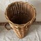Woven wicker basket, vintage rod holder