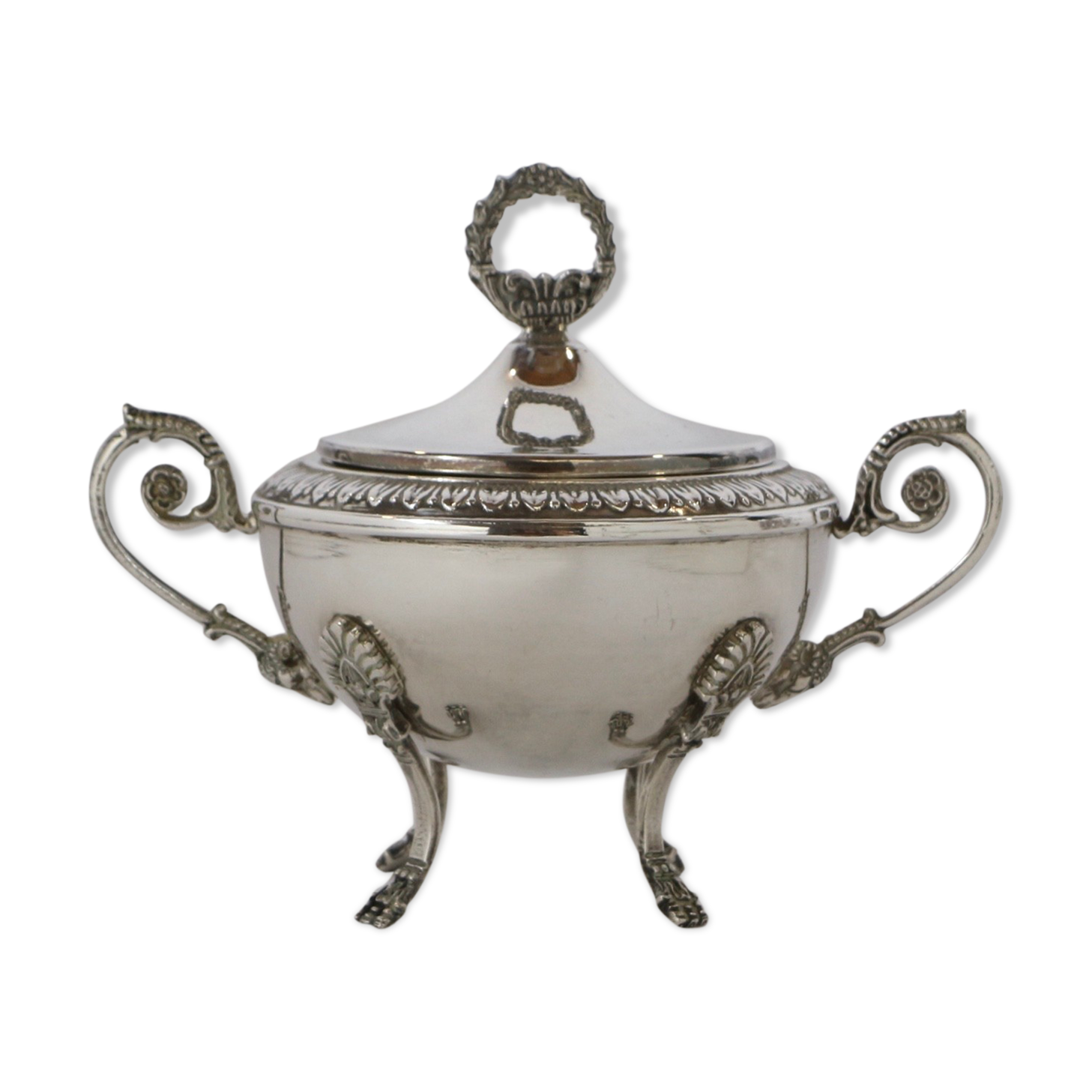 Silver sugar bowl with paw feet and ornate handles