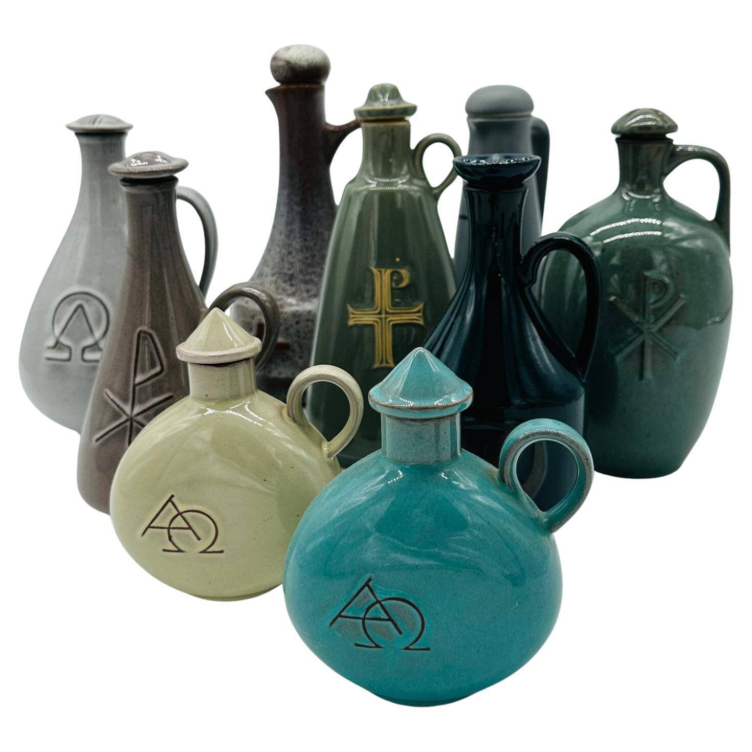 Set of nine modern sculptural ceramic vases from the mid-century, Bauhaus influence.