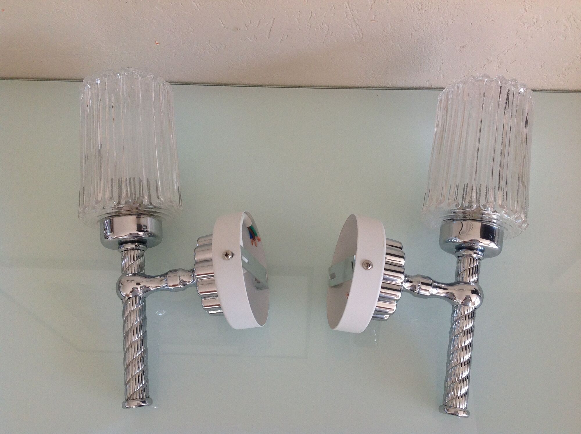 Pair of torch  in glass and chrome metal / vintage 70s wall light