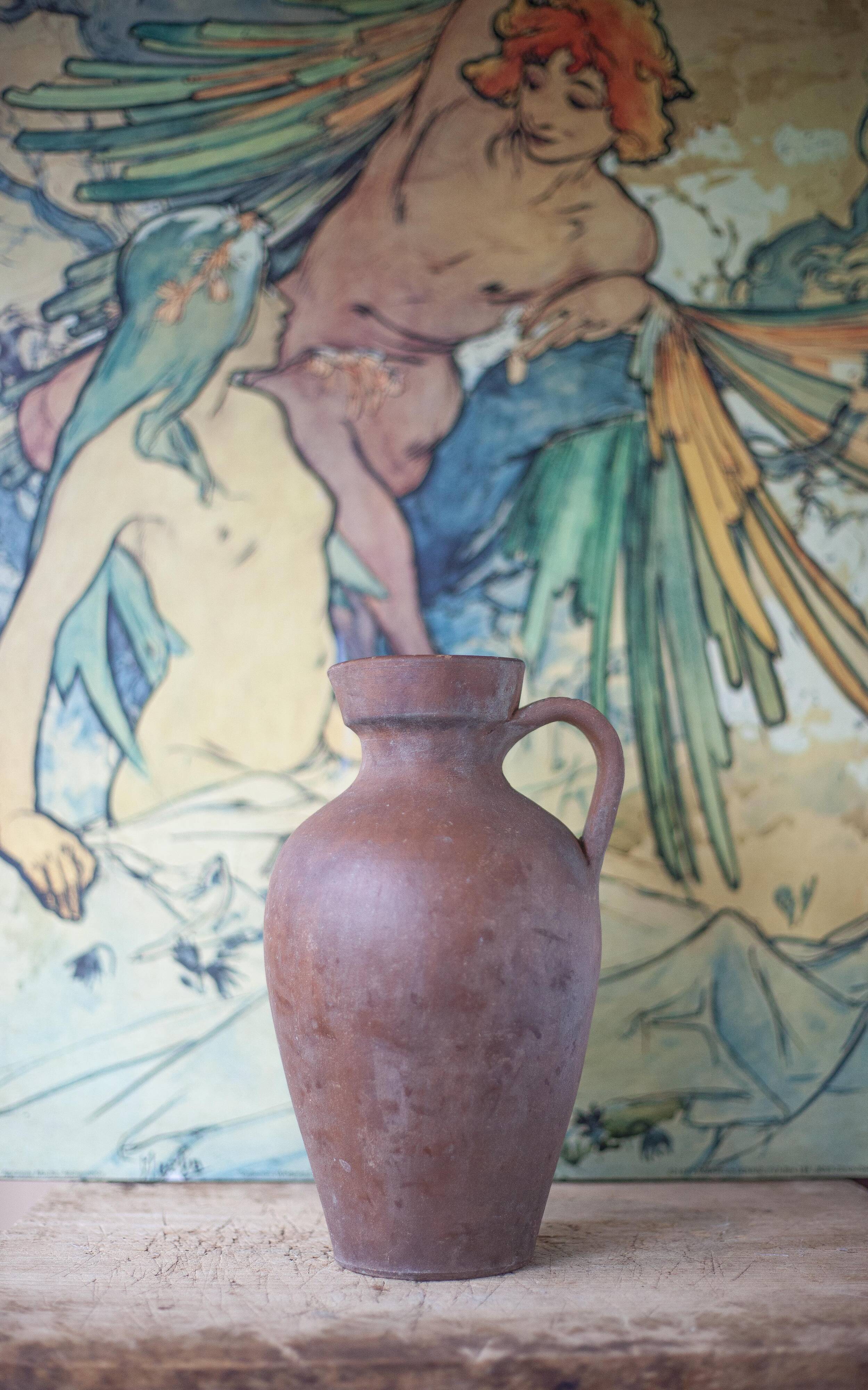 Terracotta jug with vintage handle, terracotta vase, interior decoration, primitive, pitcher