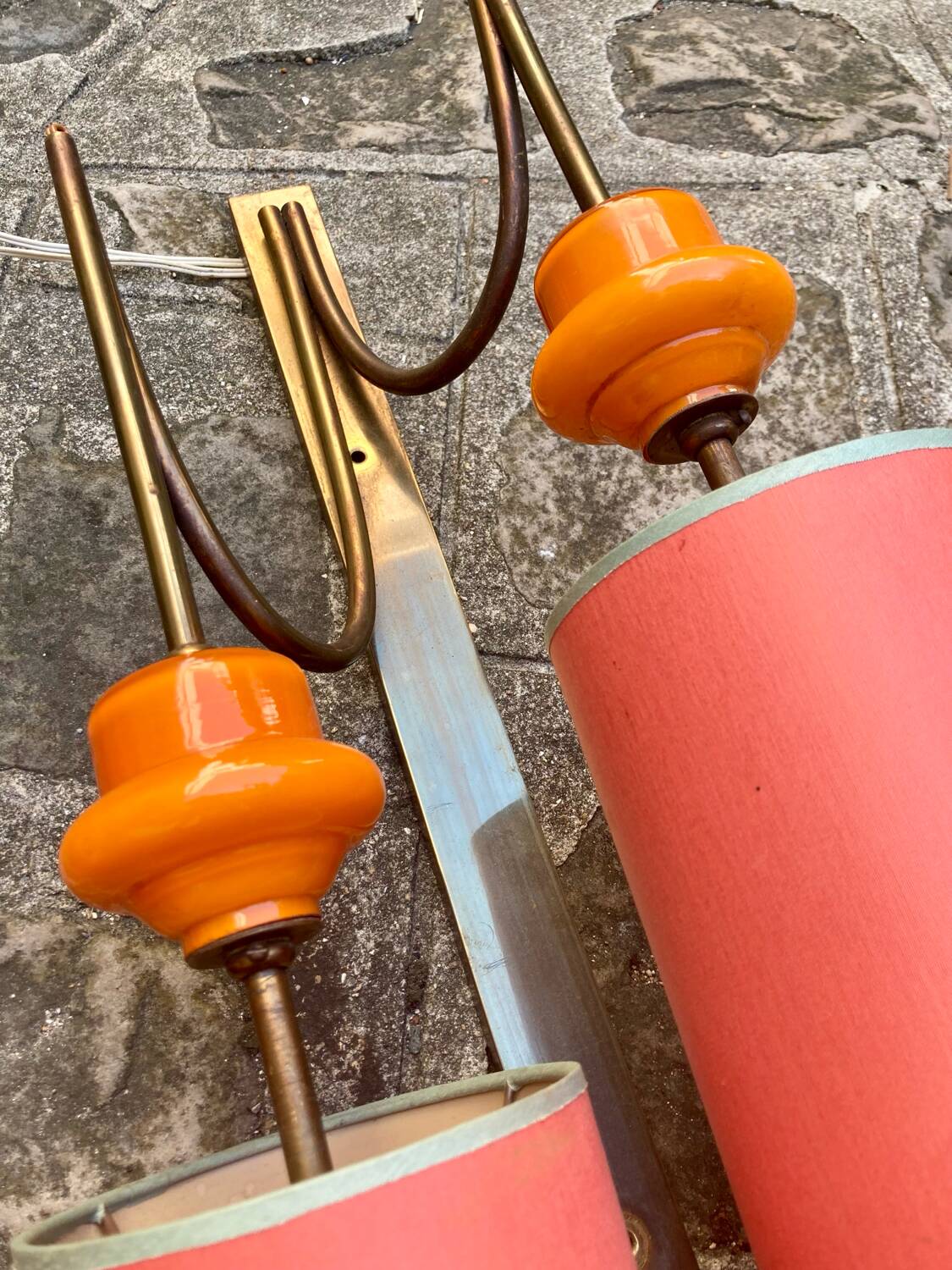 Large pair of wall sconces in brass and orange opaline glass