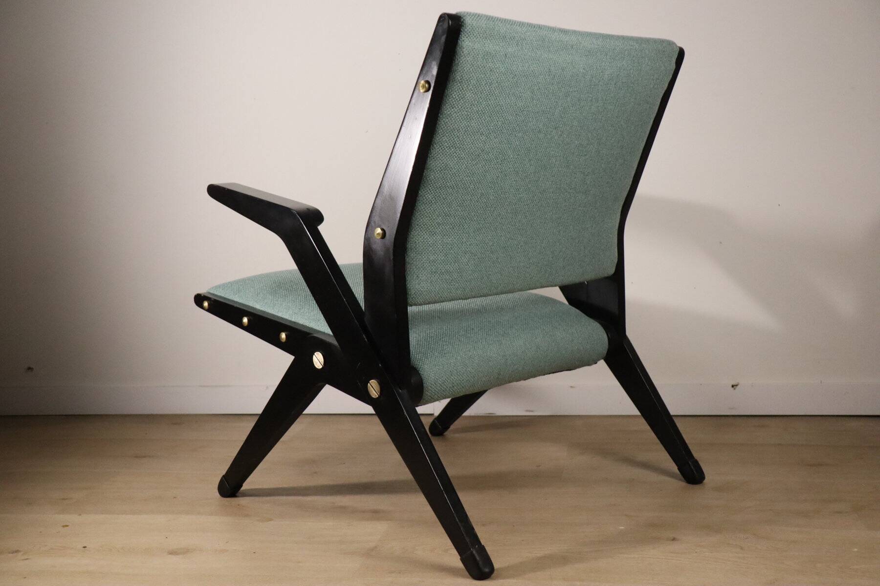 Vintage armchair from the 1960s in black wood and fabric.