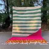 Handwoven Berber rug with traditional colorful patterns, size 150 x 250 cm