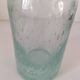 Vintage vase in very pale green bubbled glass, handcrafted