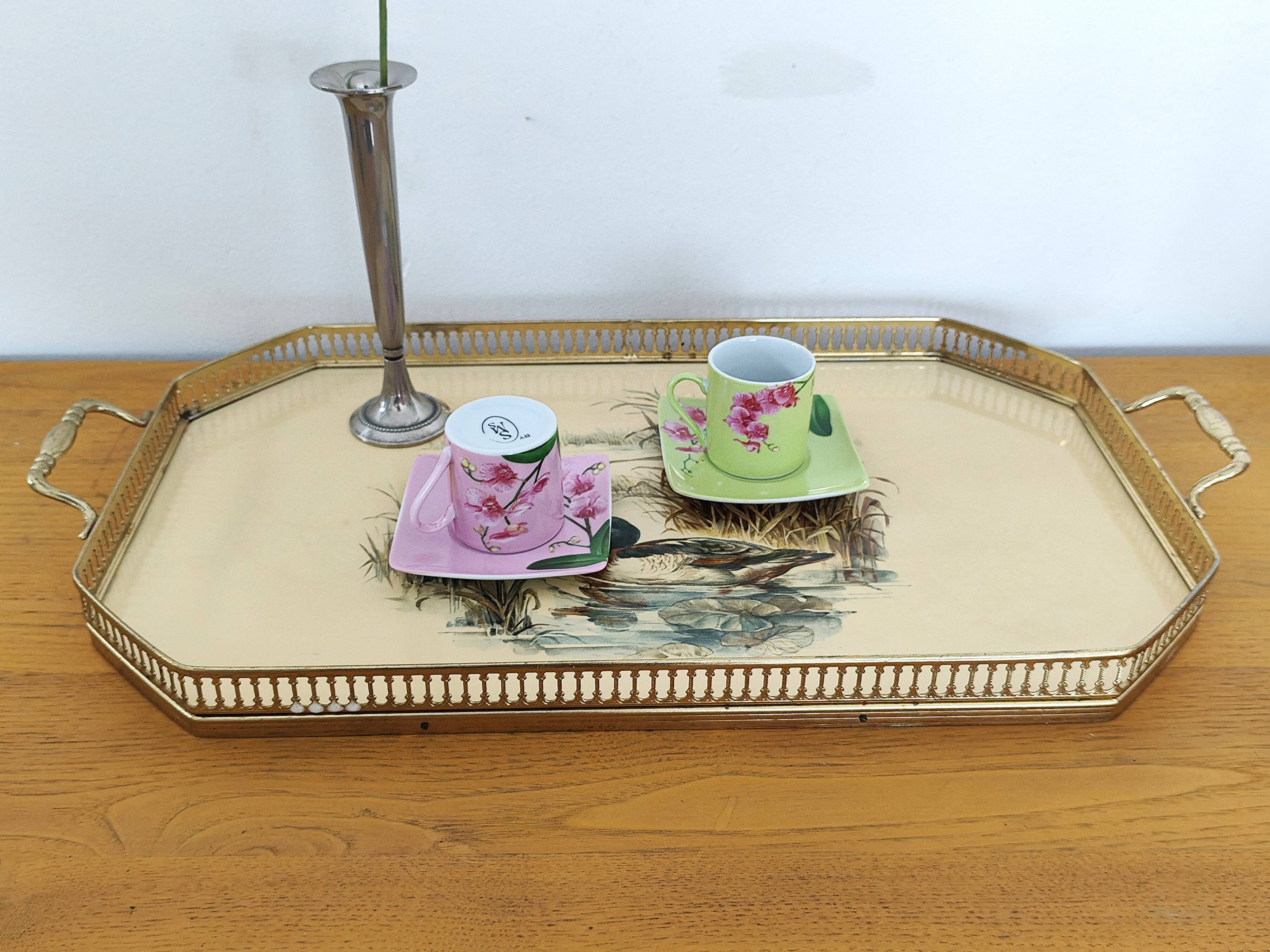Vintage service tray with a golden gallery and mirror, decorated with ducks.
