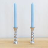 Pair of vintage cast aluminum candle holders