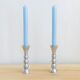 Pair of vintage cast aluminum candle holders