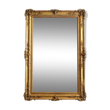 Nineteenth century monumental mirror in gilded wood
