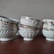 Set of 12 mismatched porcelain bowls
