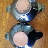 Duo of green cups with earthen pattern