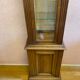 Walnut showcase, grooved uprights, 4 glass shelves