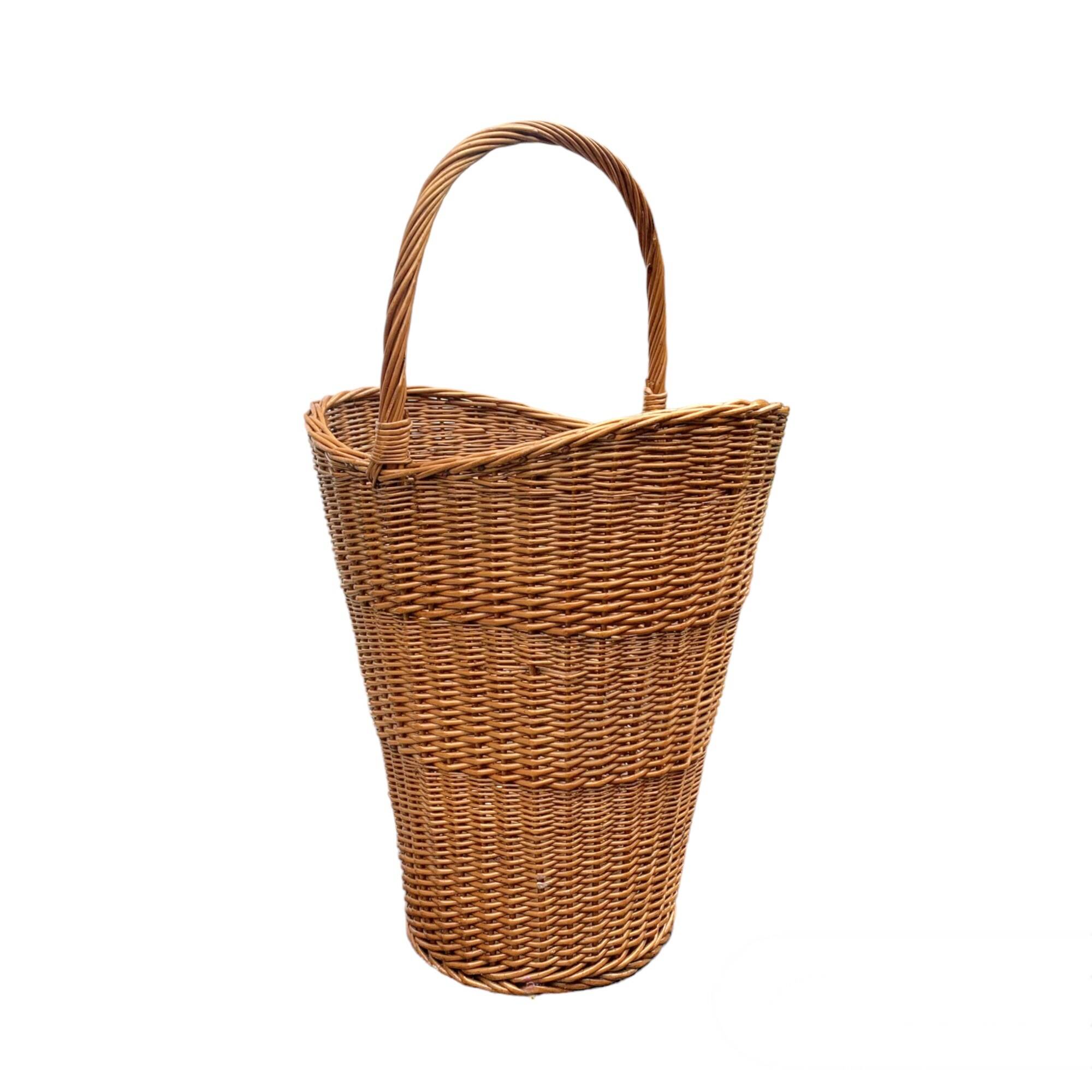 Old woven wicker umbrella stand