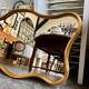 Gold free-form mirror, 102 x 60 cm