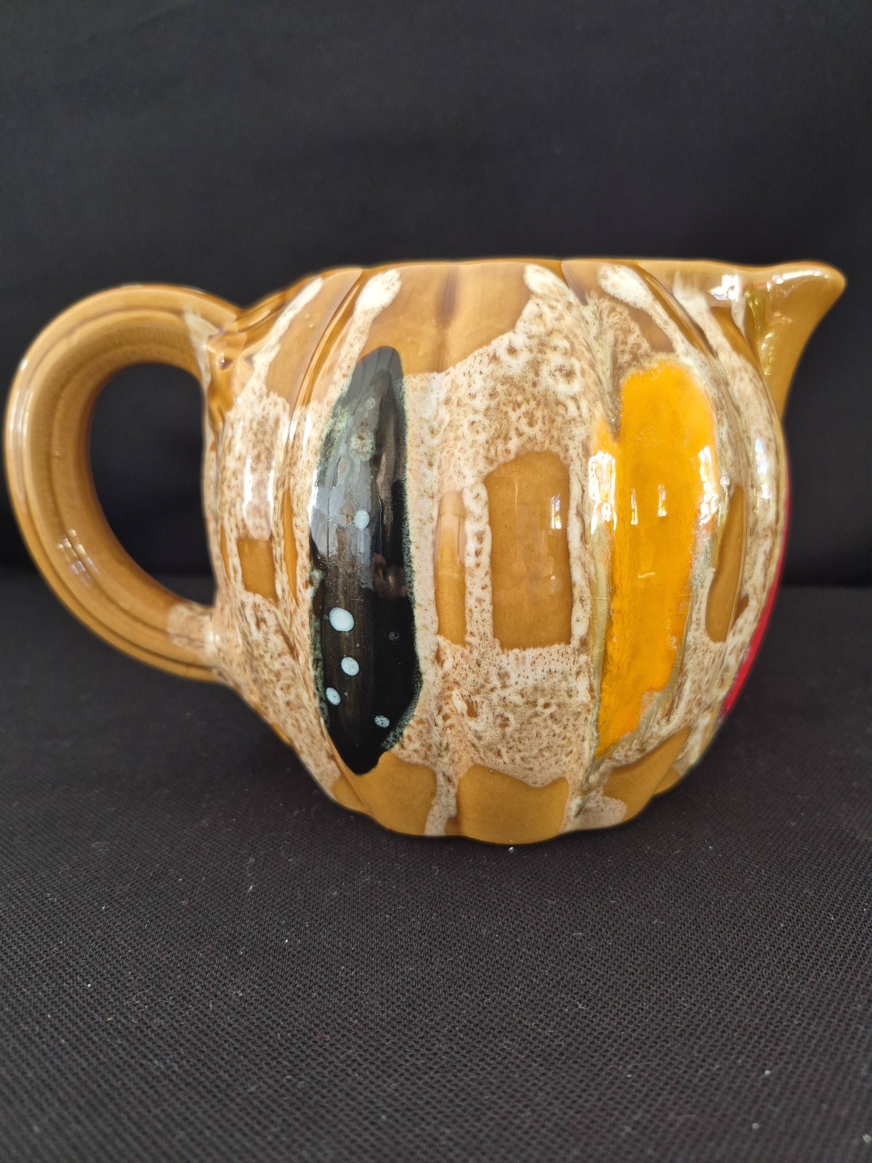 Melon-shaped ceramic jug, signed Poët-Laval, Cavaillon.