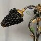 Art Nouveau table lamp with a Murano glass shade.