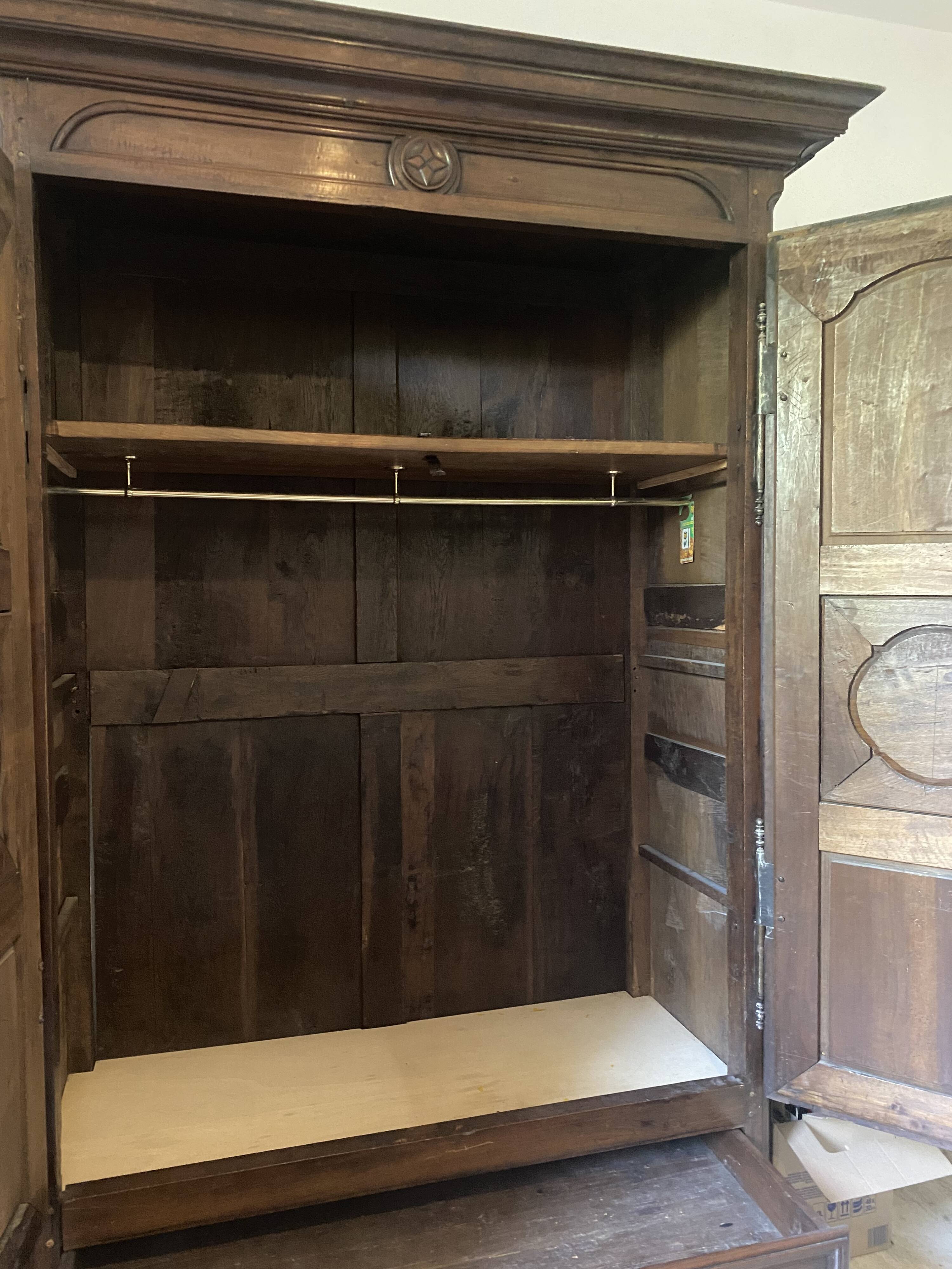 “Large regional 18th-century walnut inlaid wardrobe”