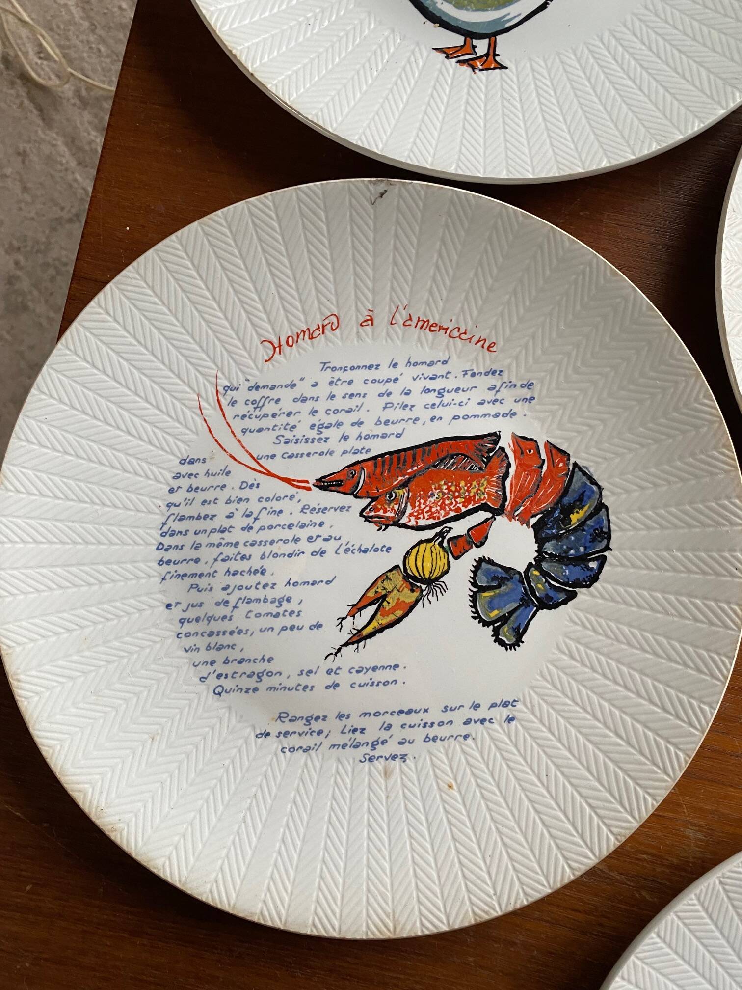 Series of 6 raymond oliver plates