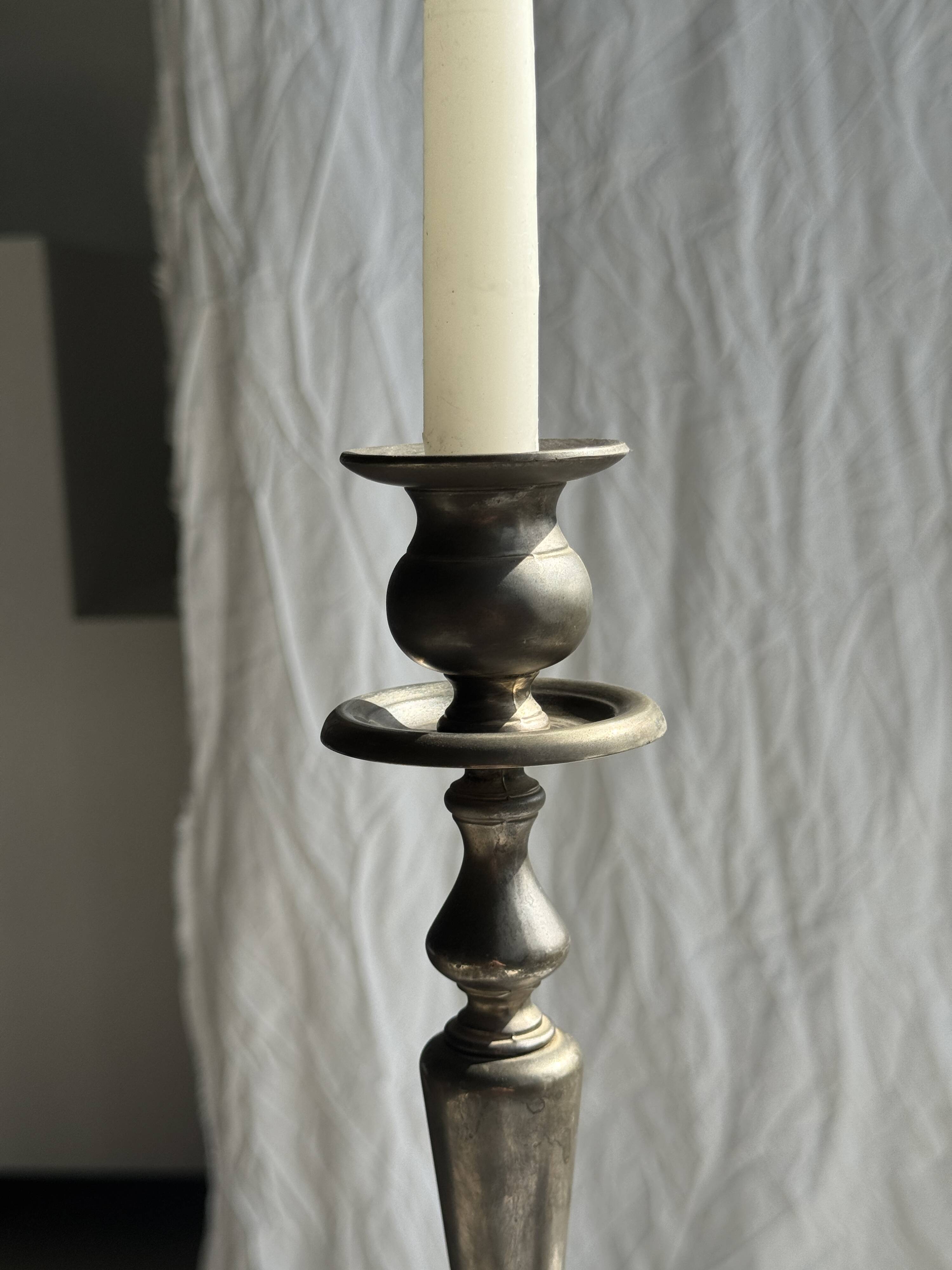 Two large antique silver-plated metal candlesticks, H30