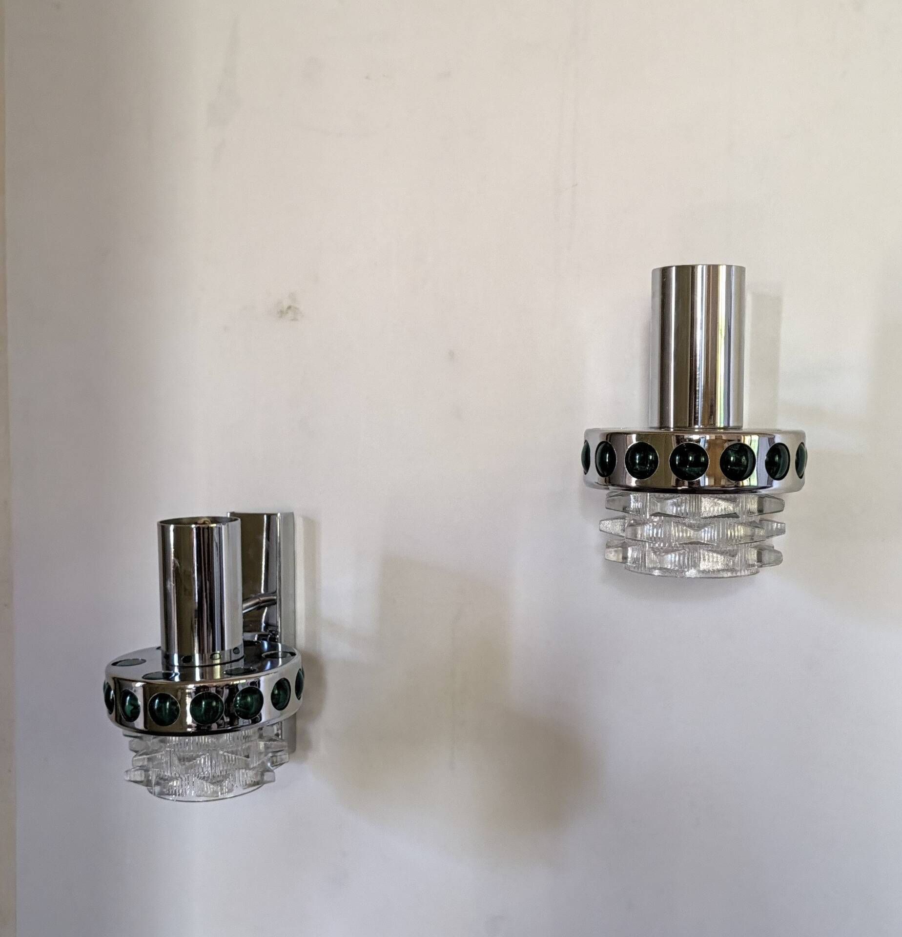 Pair of Space Age wall lights in chrome and green glass, 1970s.