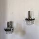 Pair of Space Age wall lights in chrome and green glass, 1970s.