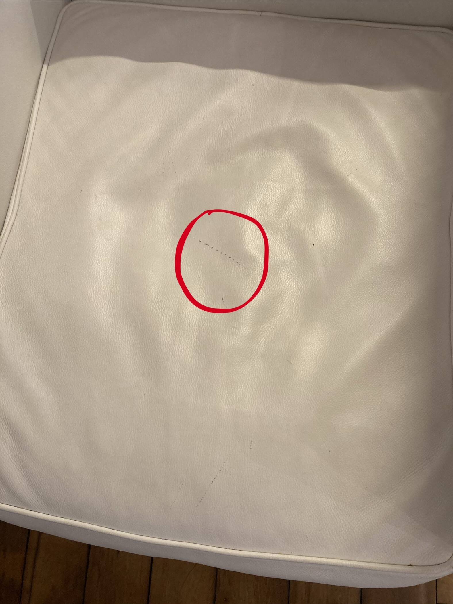 Pair of white leather and chrome armchairs