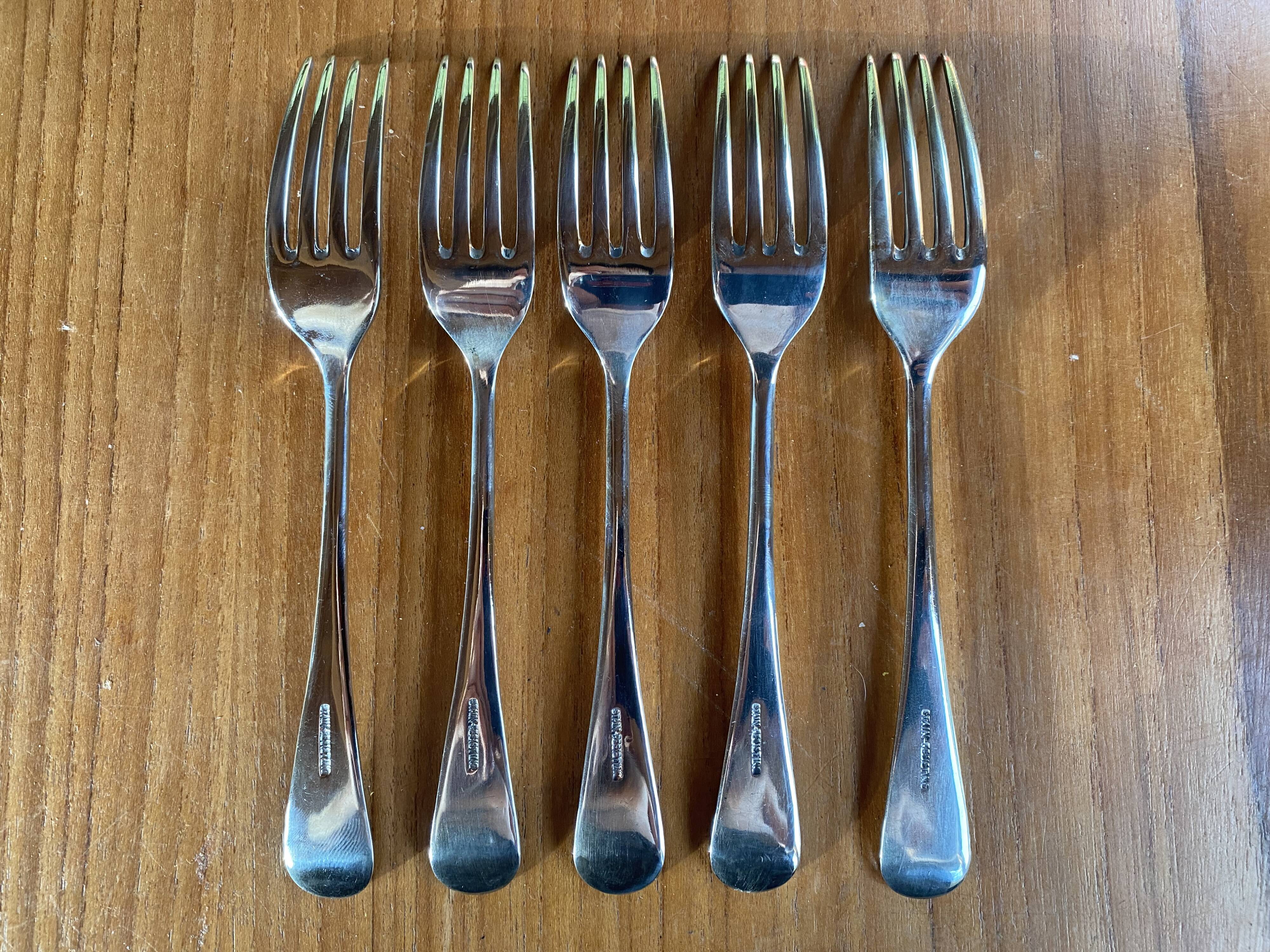Set of 5 silver English forks