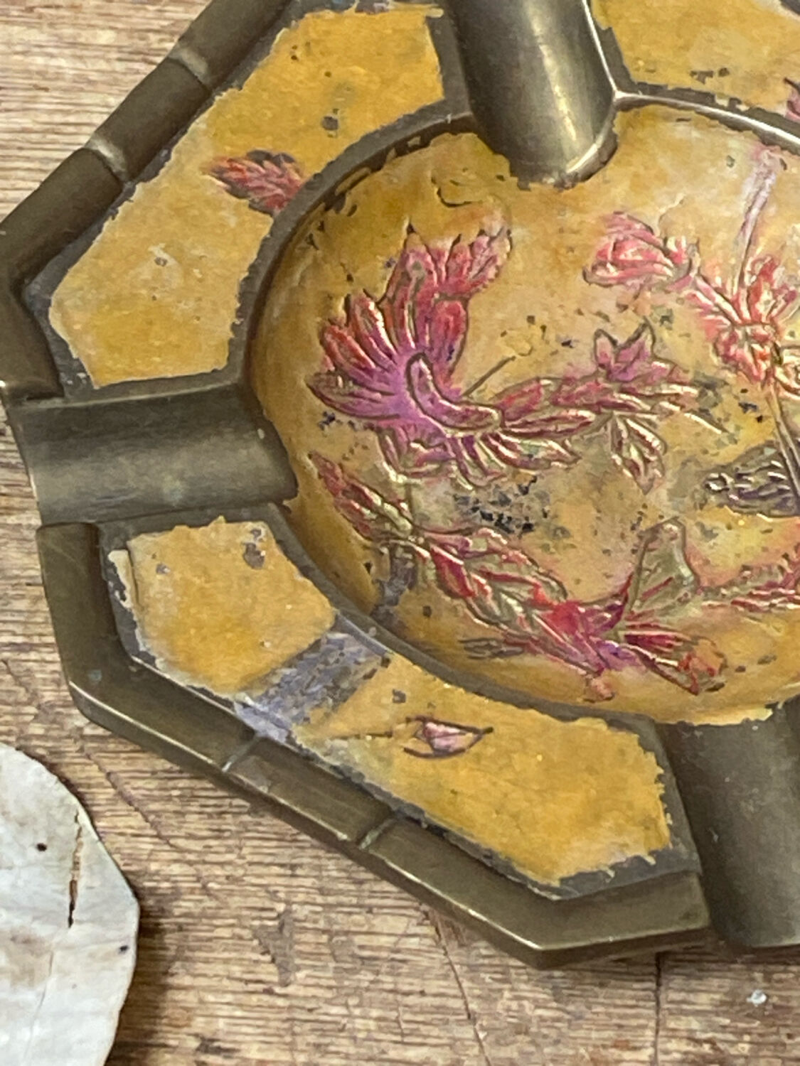 Enameled brass ashtray with floral decoration