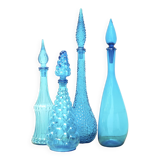 Set of four Italian blue glass carafes, 1960s