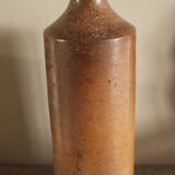 Vintage stoneware liqueur bottle with spout