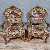 Pair of Louis XV style Baroque armchairs in gilded and carved wood circa 1900