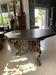 Octagonal oak table, 19th century, with griffins.