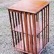 Art Deco style revolving bookcase in walnut and oak