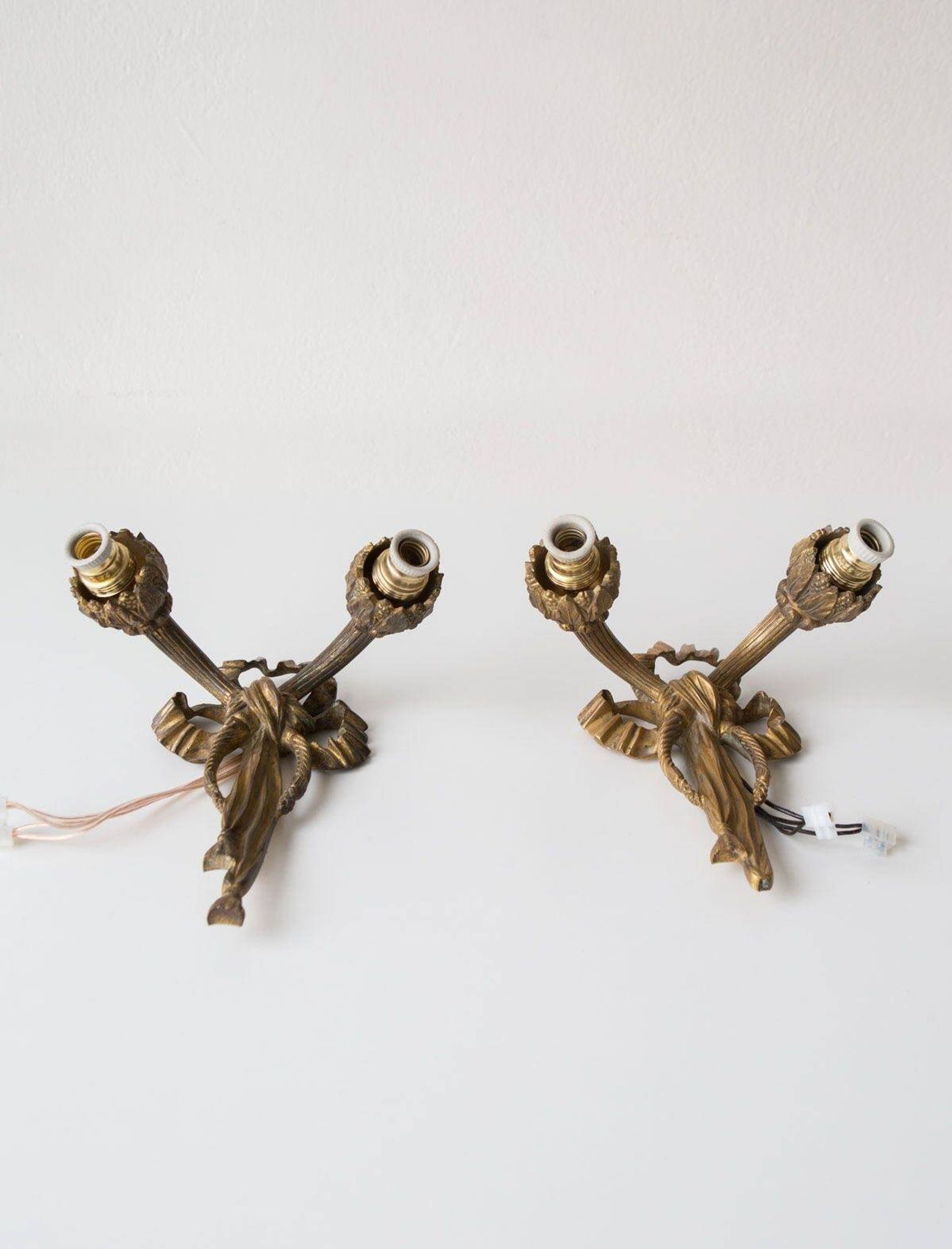 Pair of old French bronze wall lights from the beginning of the 20th century.
