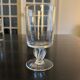 10 old glasses with twisted stems