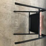 Old chair with armrest restored in metallic pink