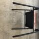 Old chair with armrest restored in metallic pink