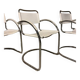 Lot of three vintage tubular armchairs from the 70's