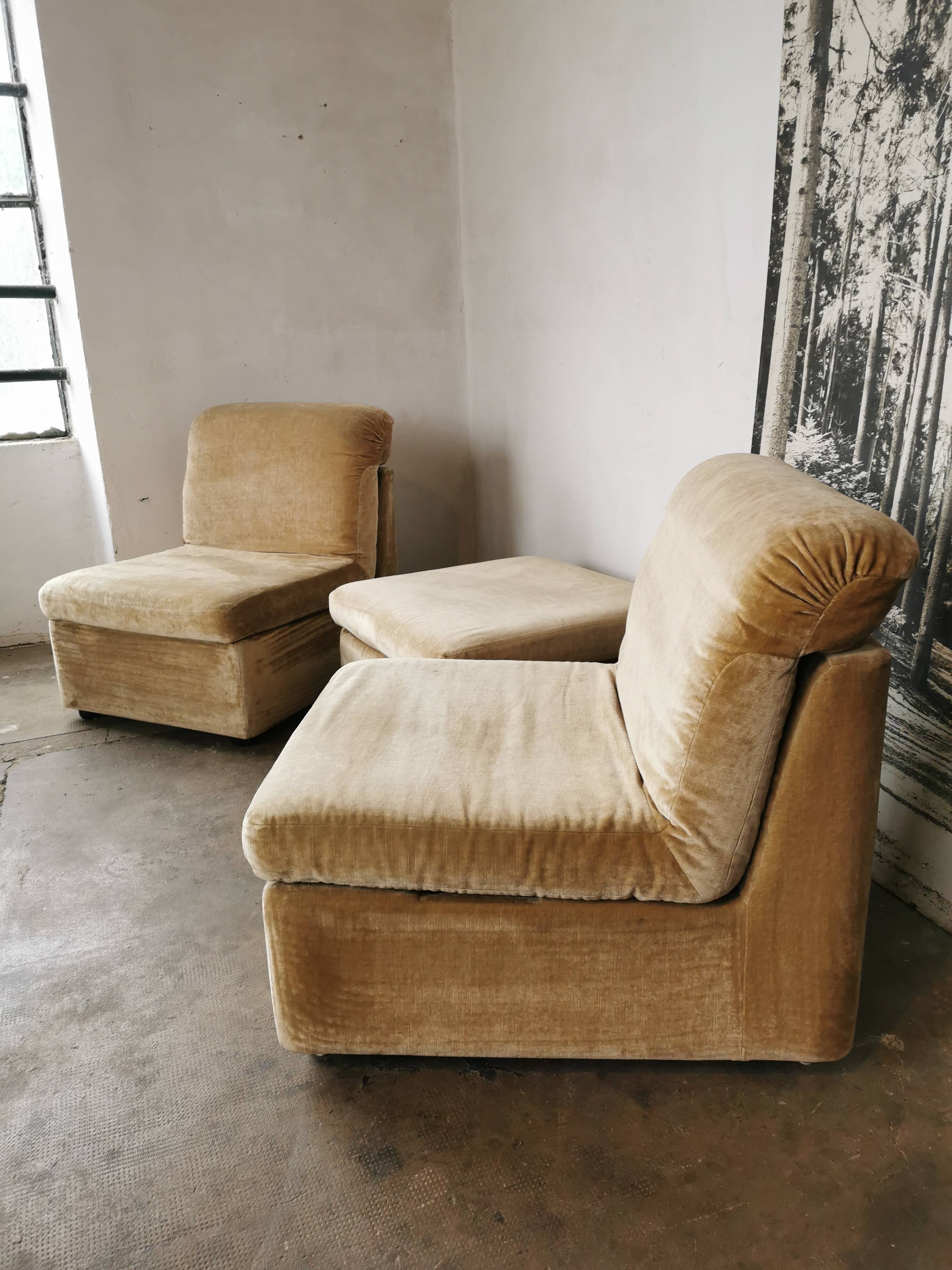 Pair of modular velvet armchairs and ottoman