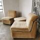 Pair of modular velvet armchairs and ottoman