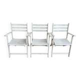 Folding wooden armchairs