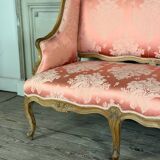 Louis XV bench in carved natural wood, 18th century