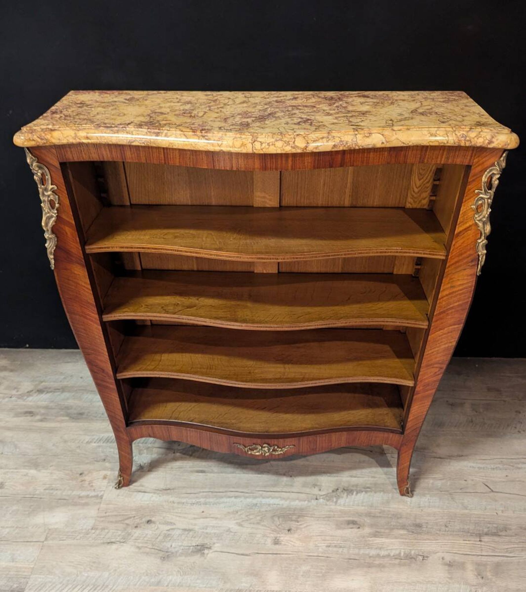 Bureau in the Louis XV style with rosewood marquetry and a marble top.