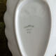 Small shell-shaped ramekin in antique Pillivuyt porcelain.