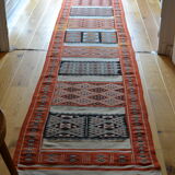 Old carpet Berber corridor path