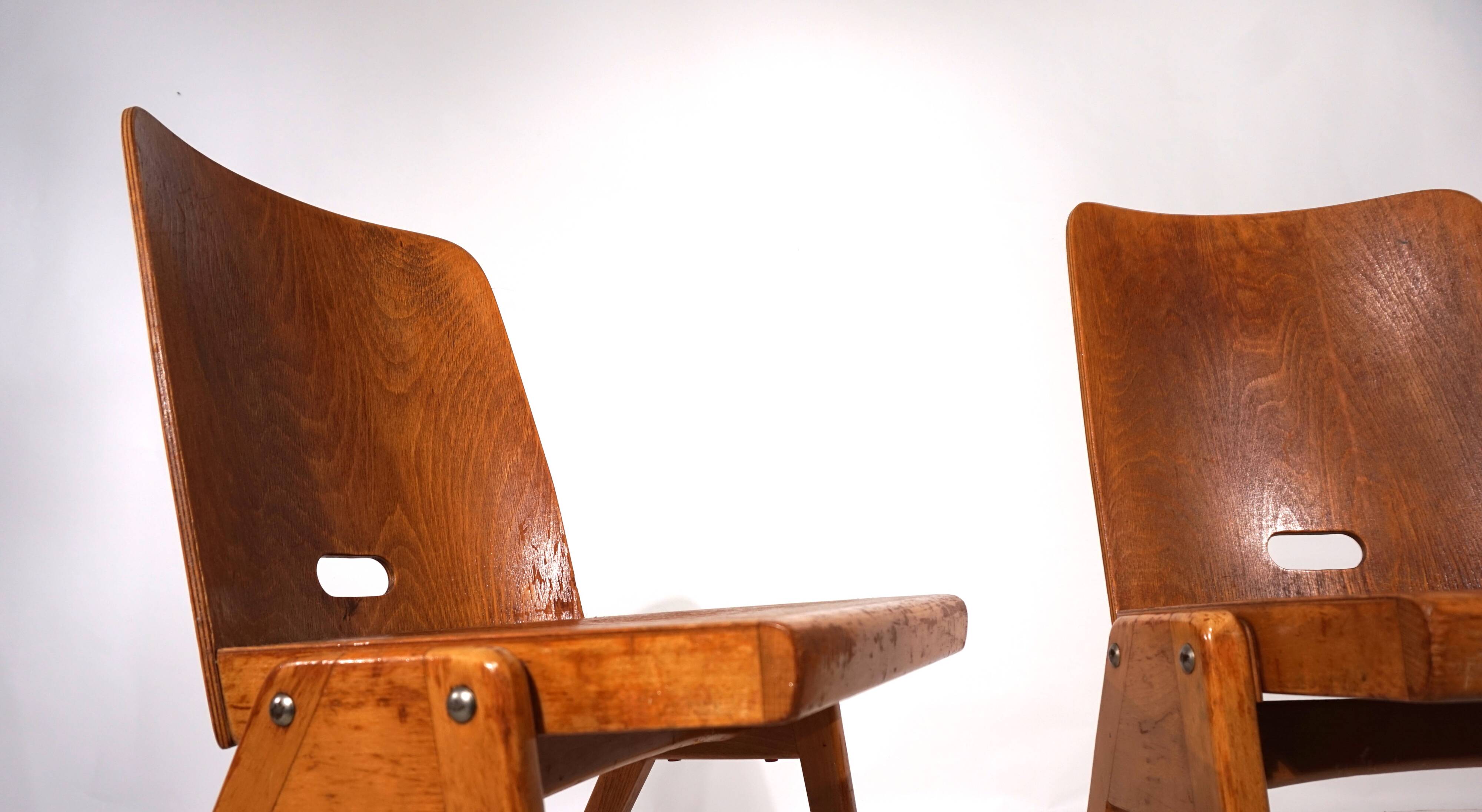 Set of two stackable plywood dining chairs, 1960