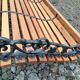 Old garden bench with vintage cast iron legs xxeme
