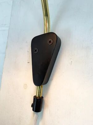 Scandinavian Diabolo wall light model 215 by EAE, Sweden, 1950s.