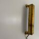 Small simple cylindrical brass wall light from the mid-century, 1950s, Germany.