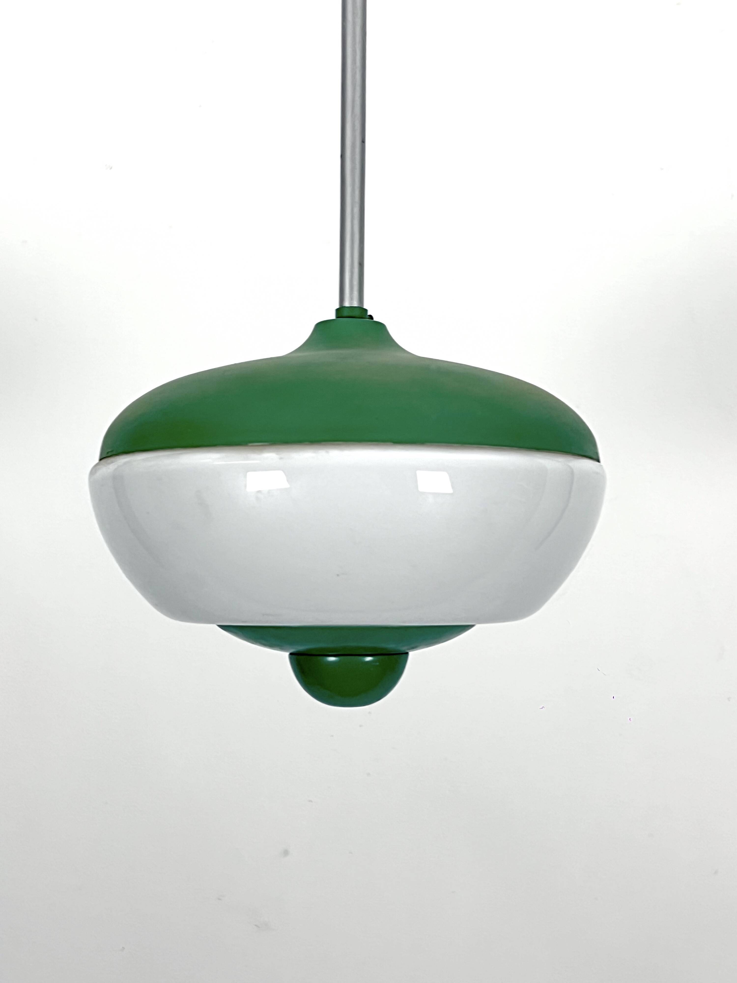 Mid-Century green lacquer and milk glass pendant. Italy 1950s